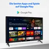 A television displaying the Google Play interface with various apps and movies. Produktbild-Vorschau