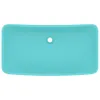 A top-down view of a rectangular, light green ceramic sink with a drain hole in the center. Podgląd zdjęcia produktu