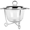 A clear studio shot of a glass casserole dish with a metal lid and stand. Produktbild-Vorschau