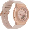 A close-up, angled view of a pink and rose gold Casio G-Shock watch against a white background. Voir les images du produit