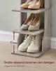 A three-tier shoe rack with shoes on each shelf, next to a wall and on a wooden floor. A measurement graphic indicates the spacing between shelves. Produktbild-Vorschau