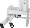 A close-up view of the base of a white medical or massage table, showing a wheel and a leveling foot. Náhled obrázku produktu