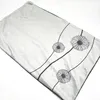 A light gray pillow with a black floral pattern on a white background. Produktbild-Vorschau