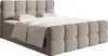 A bed with a headboard and bedding, shown against a white background. Voir les images du produit