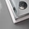 Close-up view of a shower cabin corner with a drain visible. Anteprima dell’immagine prodotto