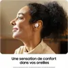 A woman wearing earbuds, with text overlay. Podgląd zdjęcia produktu