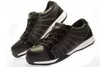 A pair of black safety shoes on a white background. Produktbild-Vorschau