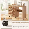 A sewing table with a sewing machine and various sewing supplies, shown with a close-up of a wheel and text highlighting its mobility. Produktbild-Vorschau