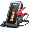 A black and gray jump starter power bank with red and black jumper cable clamps attached. Produktbild-Vorschau