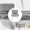 A collage of images showcasing a gray velvet chair with its features highlighted. Podgląd zdjęcia produktu