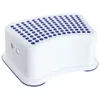 A white step stool with blue dots on top, shown from a slight angle against a white background. Náhled obrázku produktu