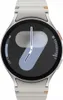A close-up shot of a smartwatch with a silver casing and a black digital display. Náhľad obrázku produktu
