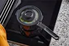 A pot of food is being cooked on an induction stove. Voir les images du produit