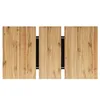 A top-down view of a wooden extendable dining table with black accents. Náhľad obrázku produktu