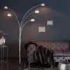 A modern living room with a floor lamp and sofa. Produktbild-Vorschau