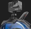 A black GoPro action camera is mounted on top of a black and blue full-face snorkel mask. Podgląd zdjęcia produktu