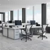 An office setting with multiple workstations and chairs. Produktbild-Vorschau