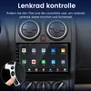 Close-up of a car's dashboard with a touchscreen media system and steering wheel controls. Voir les images du produit