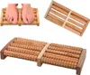 A collage of images showing a wooden foot massager, including a close-up of the product and a lifestyle shot of someone using it. Náhľad obrázku produktu