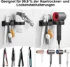 A collage of bathroom hair styling tools and their storage solutions mounted on a wall. Produktbild-Vorschau