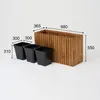 A wooden planter box with three black plastic inserts, shown with dimensions indicated by measurement lines and numbers. Náhled obrázku produktu