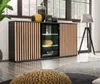 A modern sideboard with slatted wooden doors and glass-fronted cabinets, displayed in a living room setting with a floor lamp and decorative items. Anteprima dell’immagine prodotto
