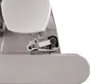 A close-up view of the needle and presser foot mechanism of a sewing machine. Náhľad obrázku produktu