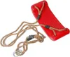 A red plastic swing seat with ropes and metal rings, isolated on a white background. Anteprima dell’immagine prodotto