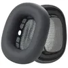 Close-up view of two black headphone ear pads. Produktbild-Vorschau