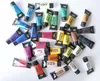 A collection of acrylic paint tubes scattered on a white surface. Anteprima dell’immagine prodotto