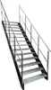 A metal staircase with handrails and grated steps against a white background. Náhled obrázku produktu