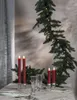 A table setting with red LED candles and a Christmas garland. Produktbild-Vorschau