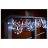 A string of starburst-shaped LED lights is draped over a wooden railing. Produktbild-Vorschau