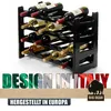 A black plastic wine rack filled with wine bottles, with overlaid text and a logo. Produktbild-Vorschau