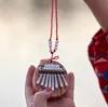 Mini kalimba - 8 touches - bois d'acajou - piano à pouces Voir les images du produit 5