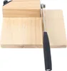 A wooden cutting board with a metal blade and black handle, likely a slicer or cutter. Náhled obrázku produktu