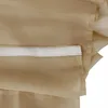 A close-up view of a beige fabric with a white velcro strip attached to it. Produktbild-Vorschau