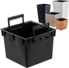 A black plastic insert with handles is shown in the foreground, with several decorative planters in various colors and textures in the background. Produktbild-Vorschau