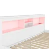 Close-up of a white bed frame with integrated storage and LED lighting. Produktbild-Vorschau