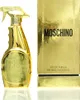 A gold-colored perfume bottle and its packaging are displayed against a white background. Produktbild-Vorschau