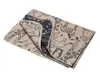 A folded blanket with a safari animal print. Produktbild-Vorschau