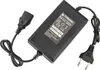 A black Powermat power adapter with two cables connected, one to a European plug and the other to a connector. Produktbild-Vorschau