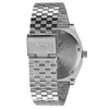 The back of a silver Nixon watch with a metal band is shown against a white background. Produktbild-Vorschau