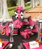 A table setting with gifts, glasses, and place cards. Náhled obrázku produktu