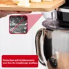 A close-up shot of a kitchen appliance, possibly a stand mixer, with a cutting board with bananas above it. Voir les images du produit