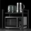 A kitchen shelf unit holding a microwave, a toaster, and a kettle. Náhľad obrázku produktu