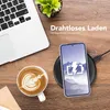 A smartphone case is shown on a wireless charger next to a laptop and a cup of coffee on a wooden desk. Produktbild-Vorschau