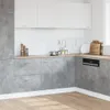 A modern kitchen with concrete-effect cabinets and white upper cabinets. Náhľad obrázku produktu