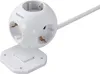A white power strip cube with multiple outlets and a power cord, resting on a white base. Produktbild-Vorschau