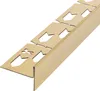 A close-up, angled view of a gold-colored metal profile with cutouts, isolated on a white background. Náhľad obrázku produktu
